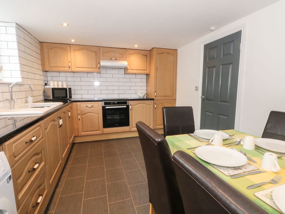 Fridge, electric kettle, toaster, cookware/dishes/utensils