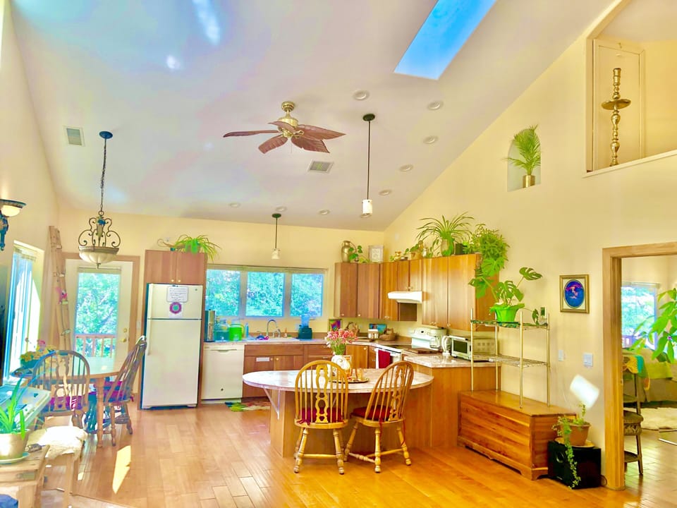 Due to the 20' cathedral ceiling, the spacious kitchen looks deceptively tiny. 