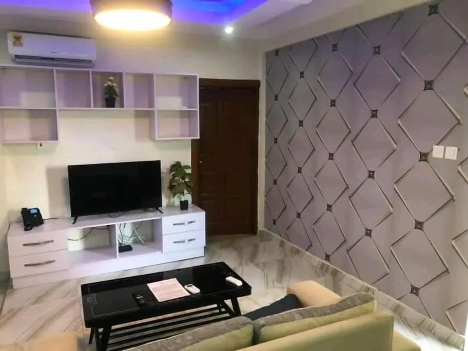 City Apartment | Living area | Flat-screen TV