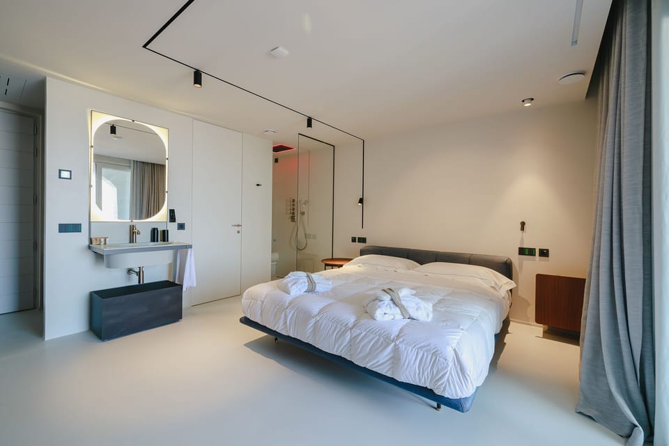 Premium bedding, down comforters, memory foam beds, in-room safe