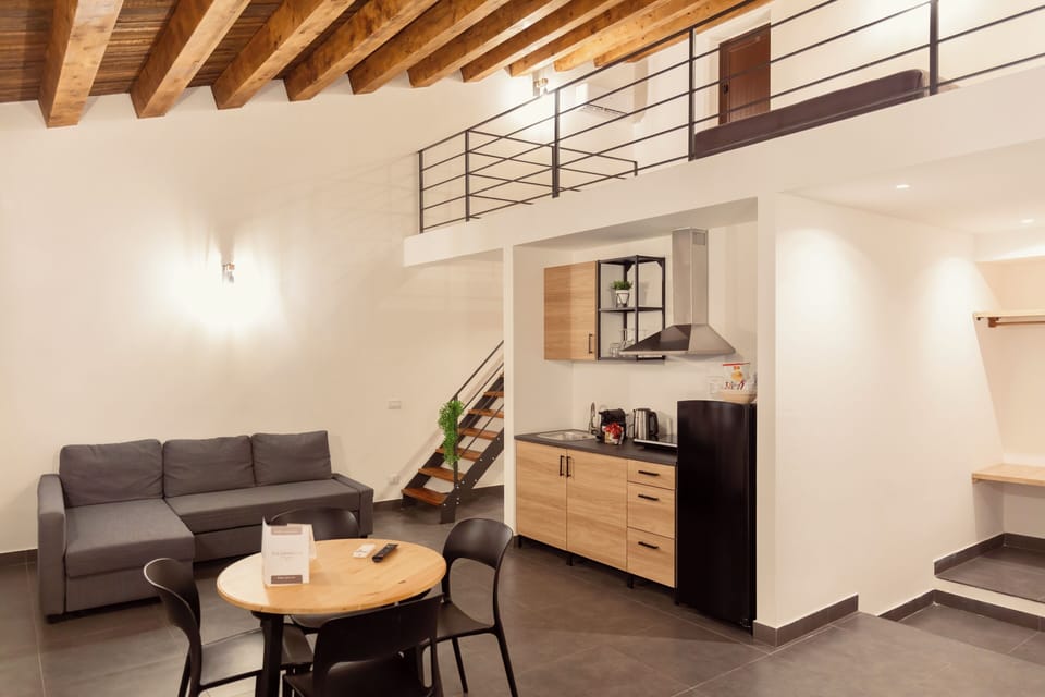 Exclusive Suite | Living area | 50-inch Smart TV with digital channels, Netflix, pay movies