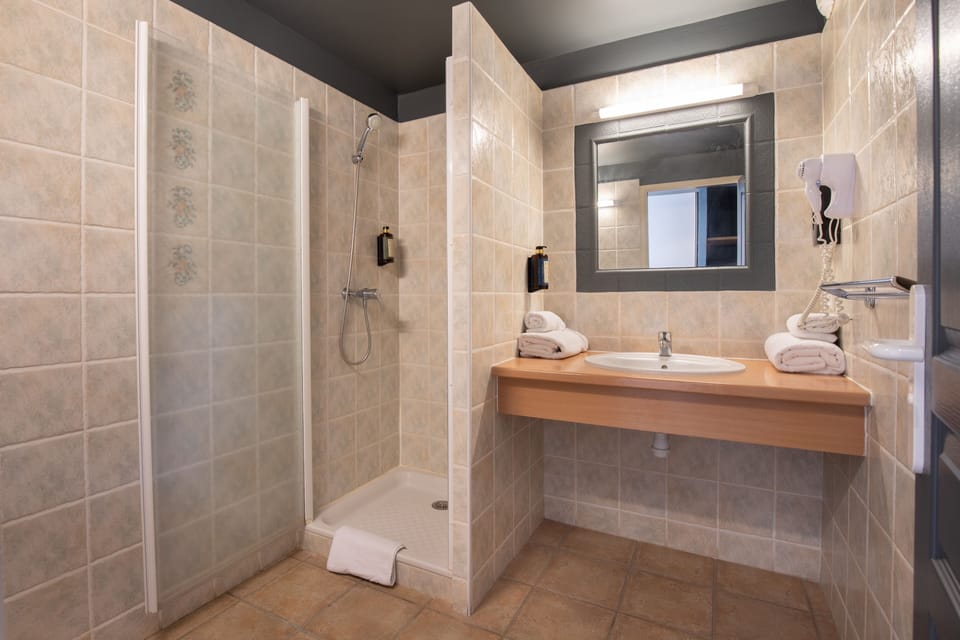 Hair dryer, towels, soap, shampoo