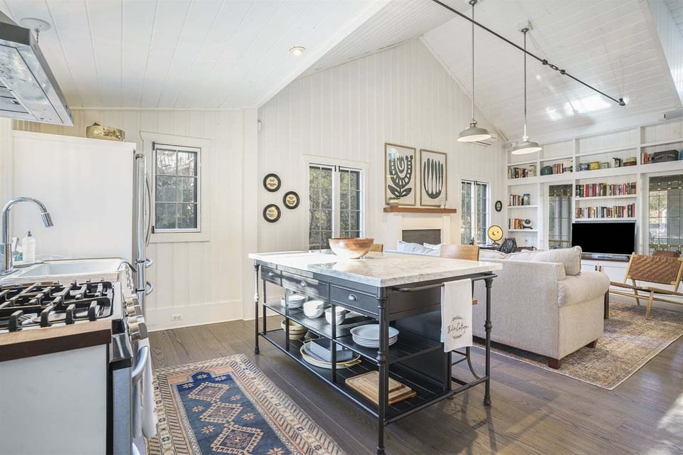 Open kitchen dining living area is great for visiting