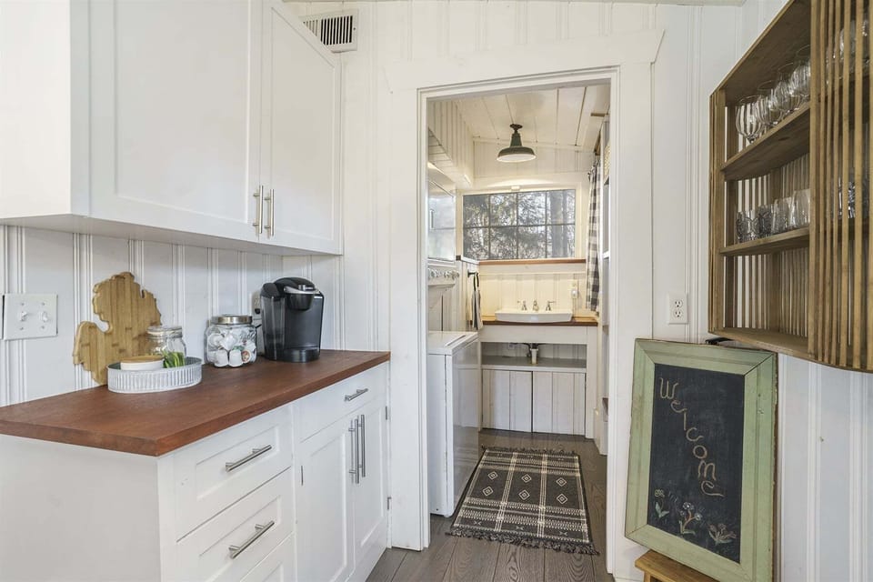 Coffee bar area leads into the pantry and laundry room