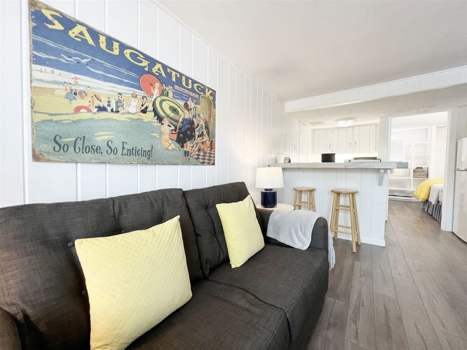 Welcome to At Ease, your charming home away from home in downtown Saugatuck