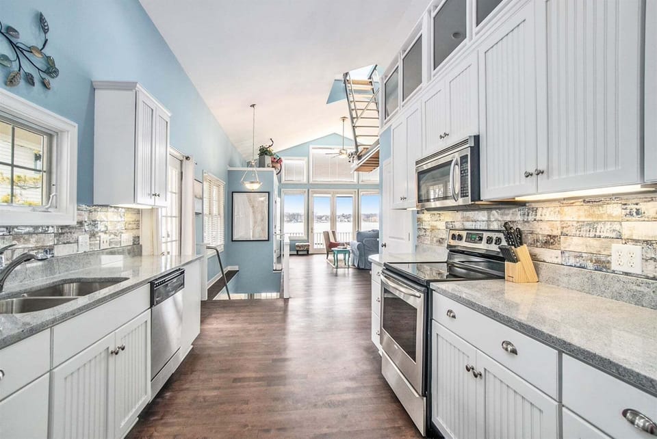 Looking through the kitchen into the living dining area
