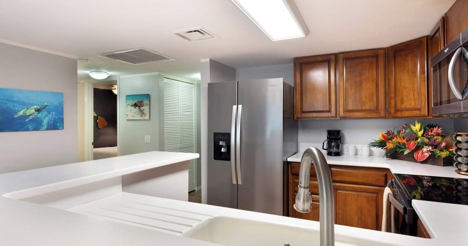Condo, Multiple Beds, Lanai, Garden View (White Sands Village #111) | Private kitchen | Full-size fridge, microwave