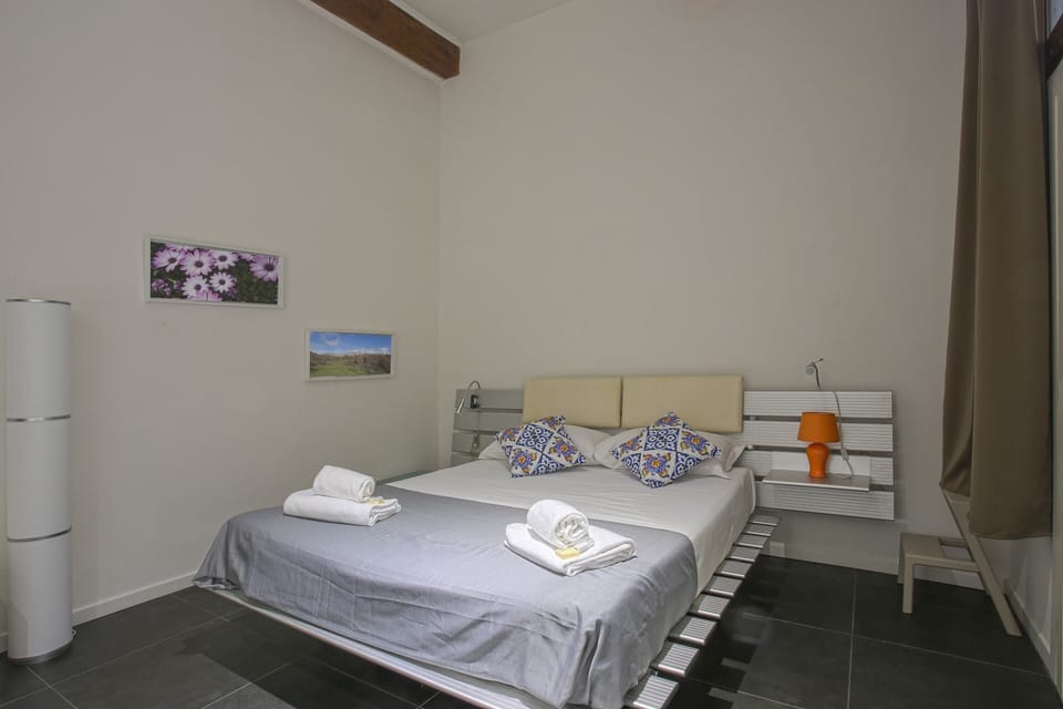 Basic Apartment, Multiple Beds | 2 bedrooms, desk, laptop workspace, iron/ironing board