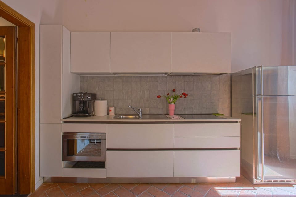 Basic Apartment, Multiple Beds | Private kitchen | Fridge, microwave, stovetop, coffee/tea maker
