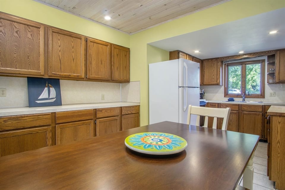 Eat in kitchen has a lot of work space.