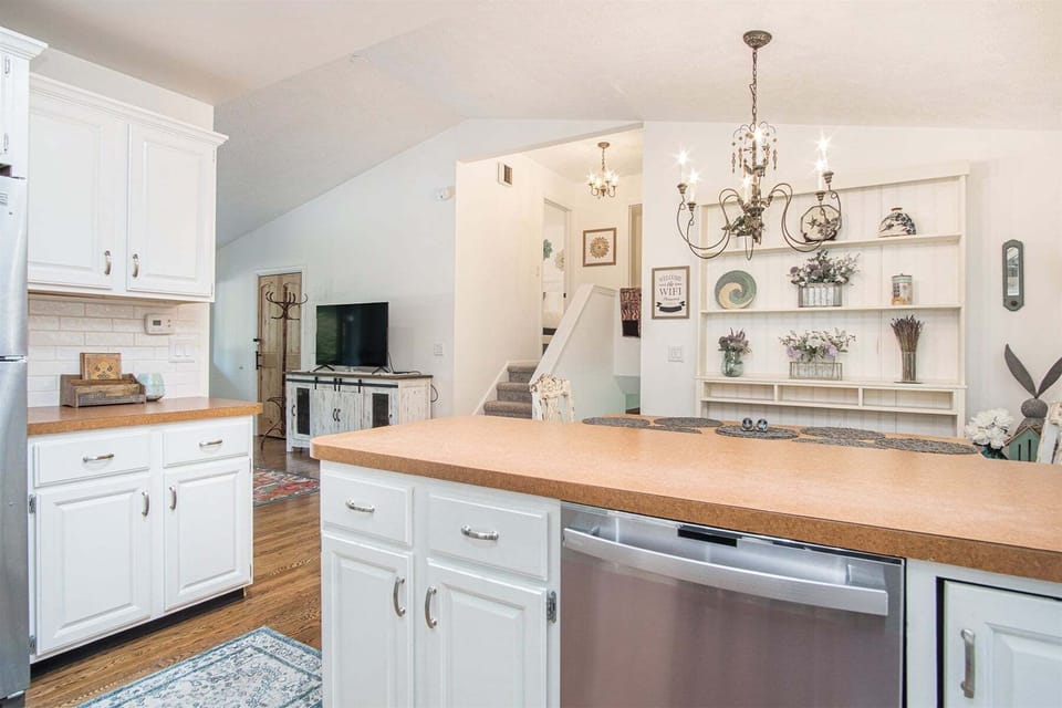 Looking from the kitchen into the dining and living areas