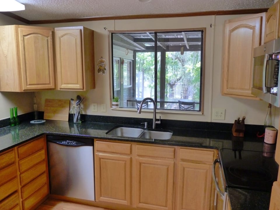 Kitchen overlooking the breakfast bar and Suwannee River