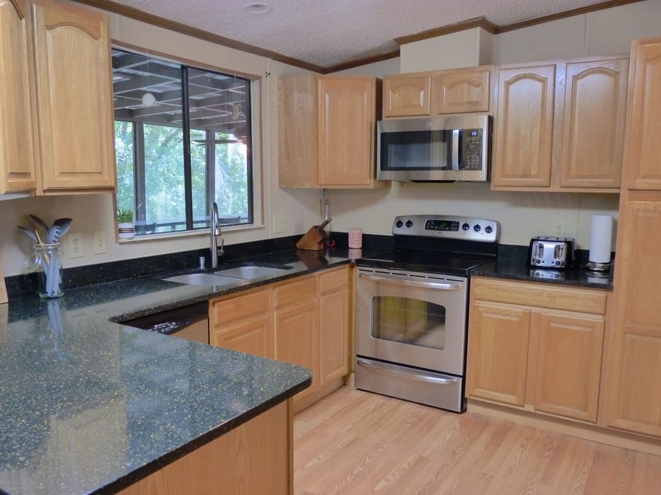 Kitchen overlooking the breakfast bar and Suwannee River
