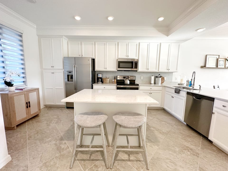 Fully equipped kitchen off dining/living area.