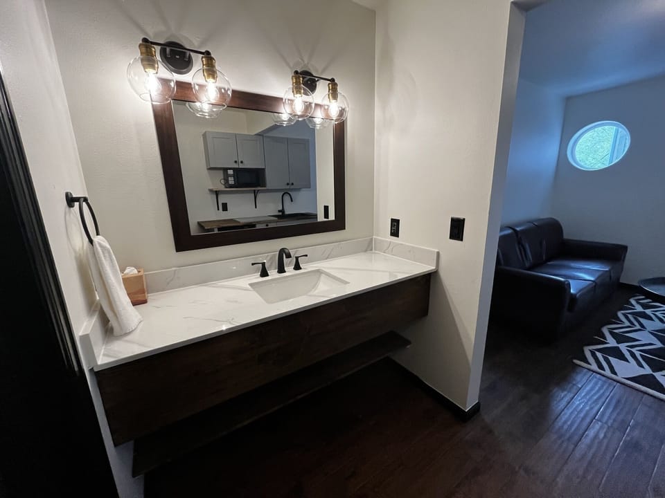 Suite, 2 Bedrooms | Bathroom | Combined shower/tub, free toiletries, hair dryer, towels