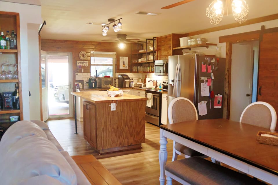 open concept kitchen / dining / living 