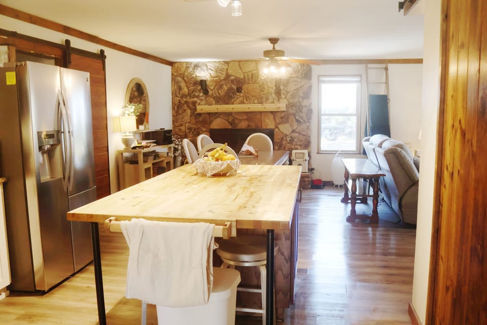 open concept kitchen / dining / living 