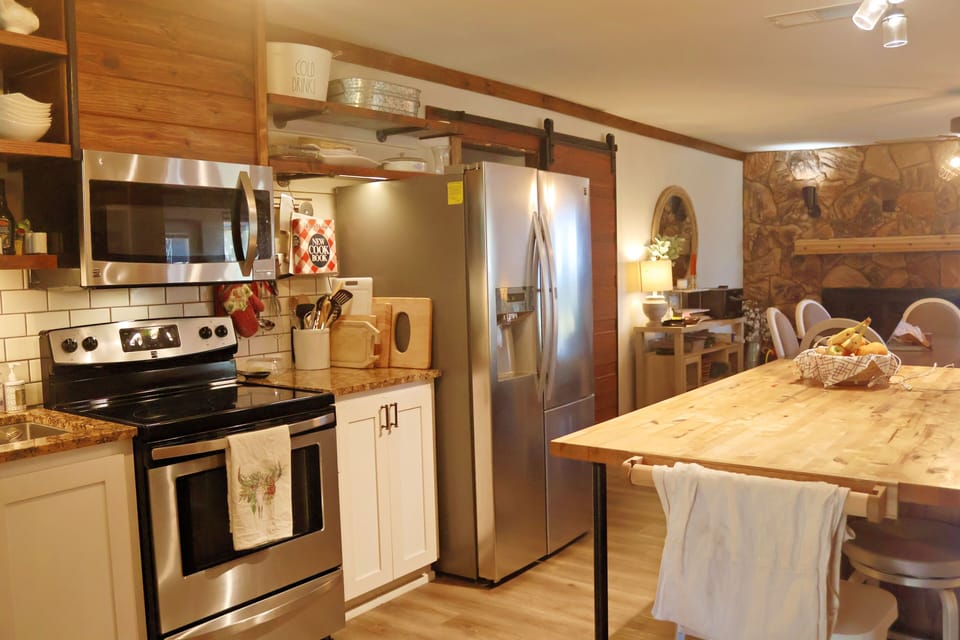 open concept kitchen / dining / living 