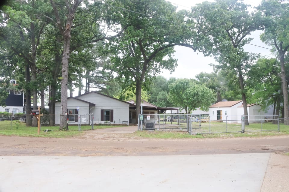 Amazing property with 2 houses, a game room, double decker dock and boat ramp.