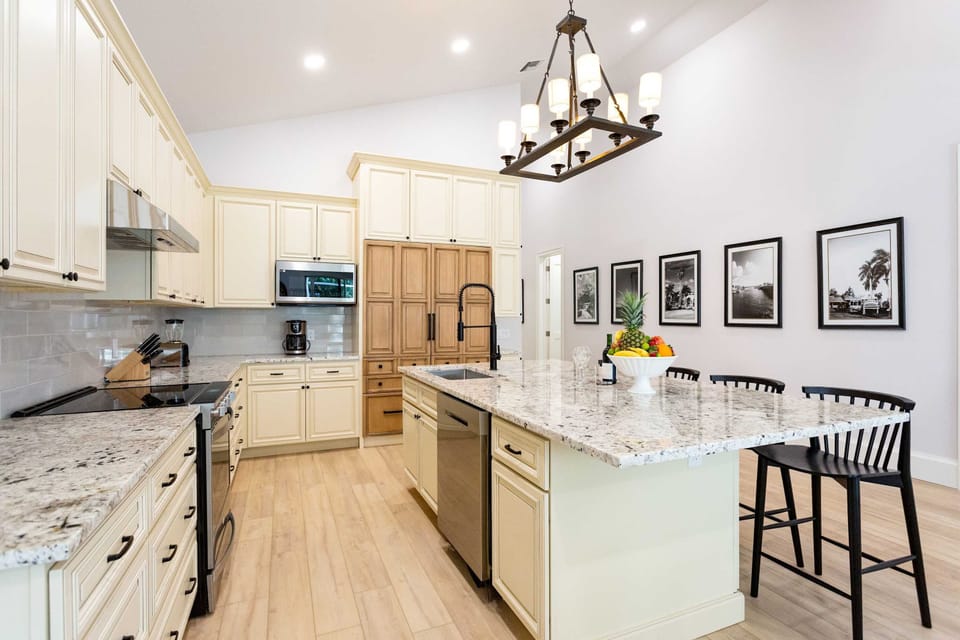 Open kitchen with premium upscale appliances; Bright and Spacious