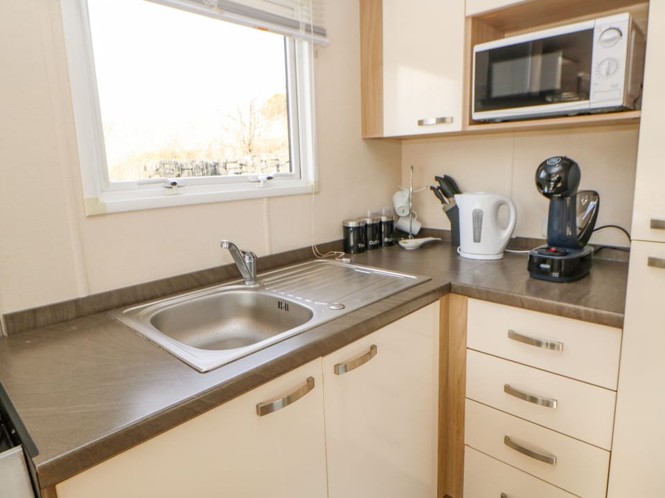 Fridge, electric kettle, toaster, cookware/dishes/utensils