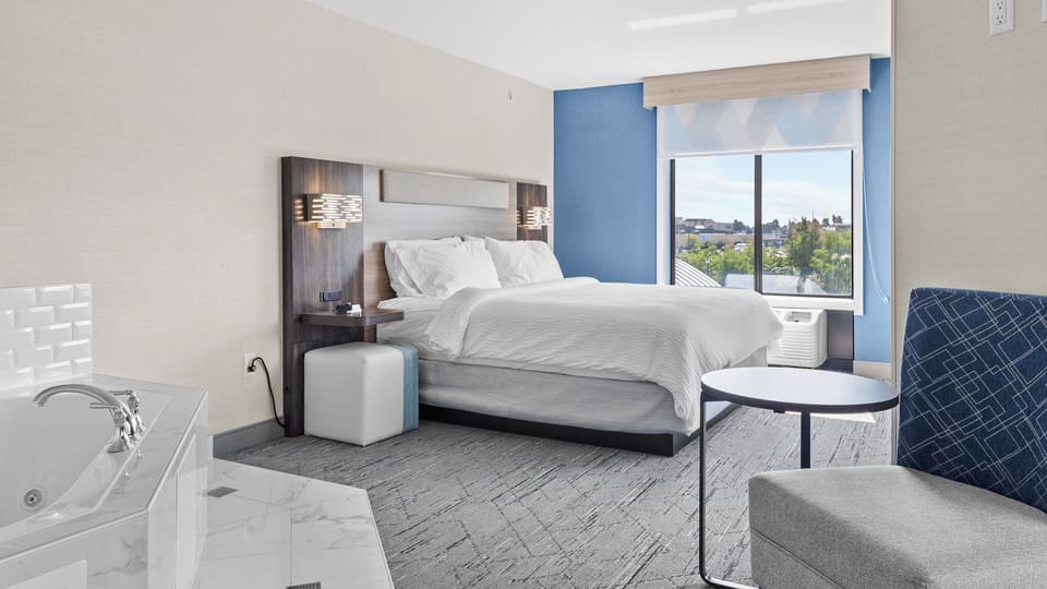 Suite, 1 King Bed, Jetted Tub | In-room safe, desk, blackout drapes, iron/ironing board