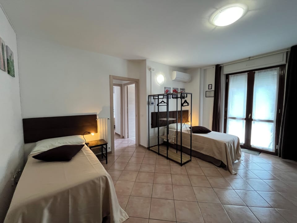 Family Room | Pillowtop beds, desk, soundproofing, free WiFi