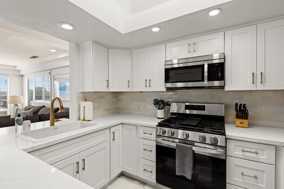 This kitchen includes all essential cooking utensils for your stay.