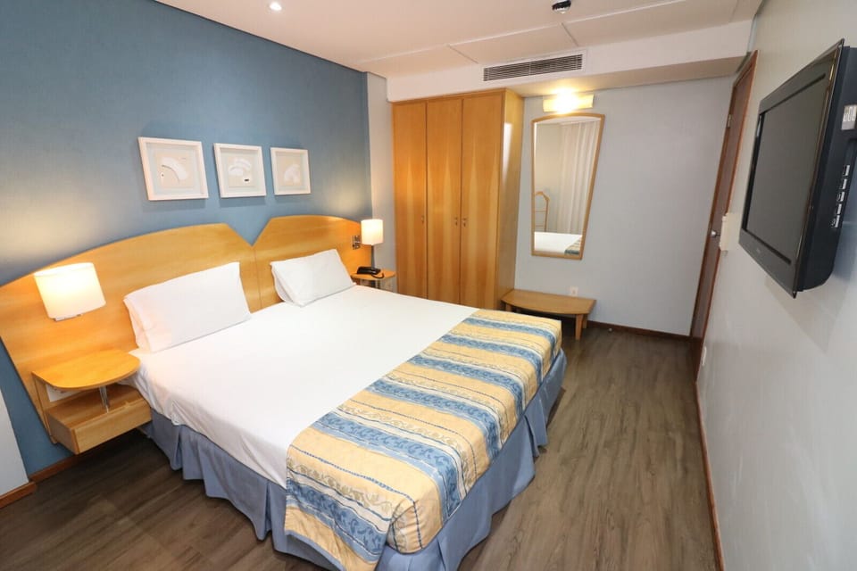 Executive Triple Room, Multiple Beds | Minibar, in-room safe, soundproofing, free WiFi