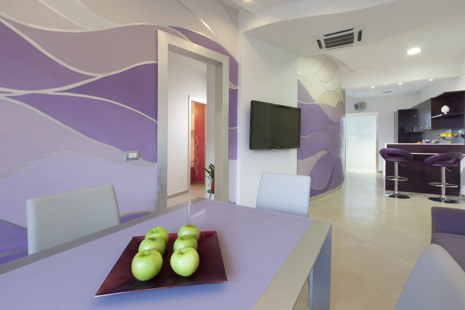 50-inch flat-screen TV with cable channels, TV