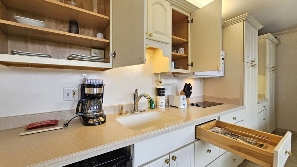 Well  stocked kitchenette cabinets & drawers