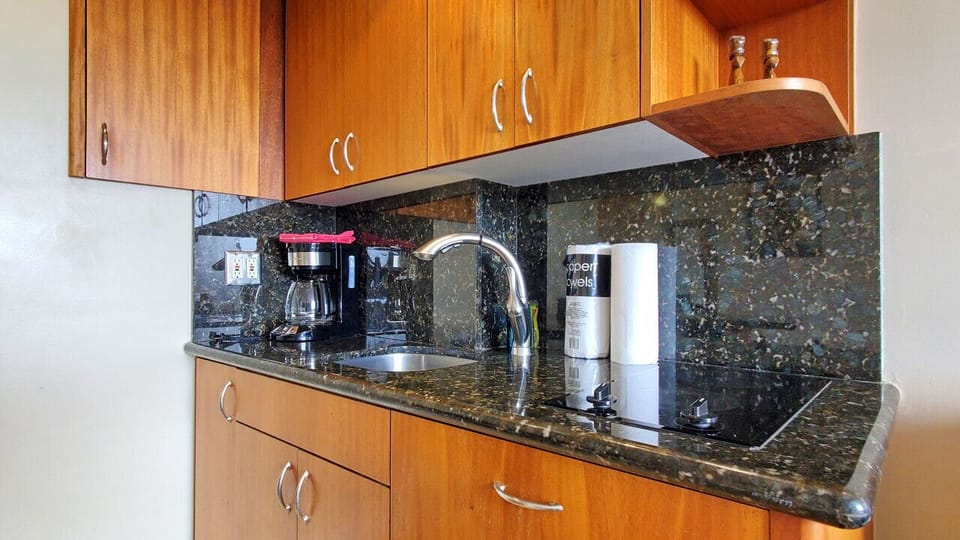 Cupboards well stocked with dishes etc.