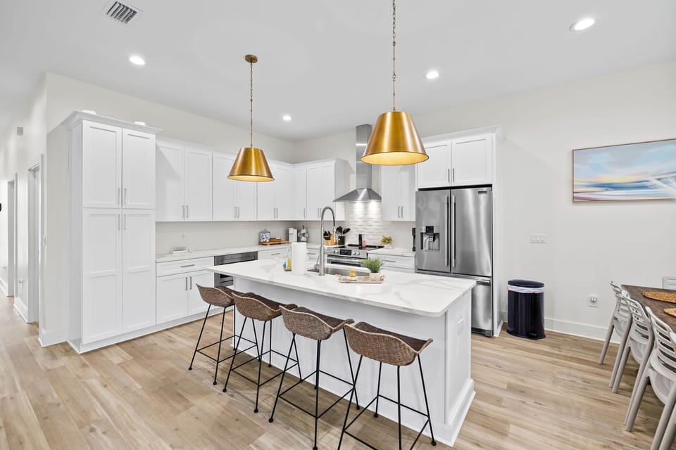 Open layout Kitchen for the Chef to impress family and friends gathering around with plenty of seating.