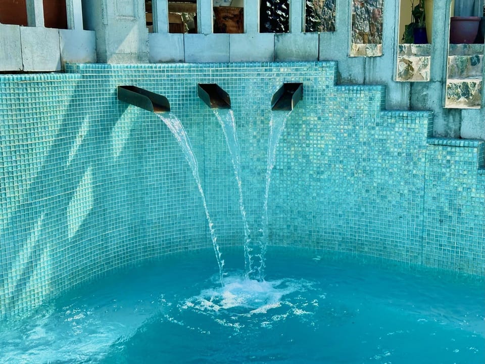 Waterfall to the pool