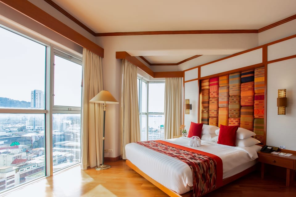 Paradise Suite Room | Minibar, in-room safe, desk, laptop workspace