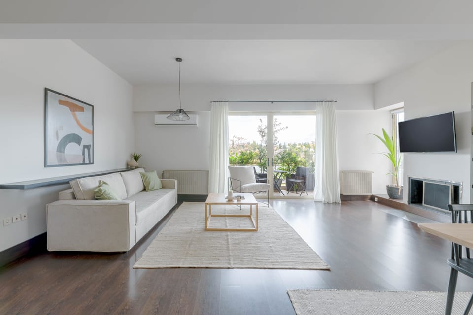 Standard Apartment | Living area | 43-inch TV with digital channels, Netflix, streaming services