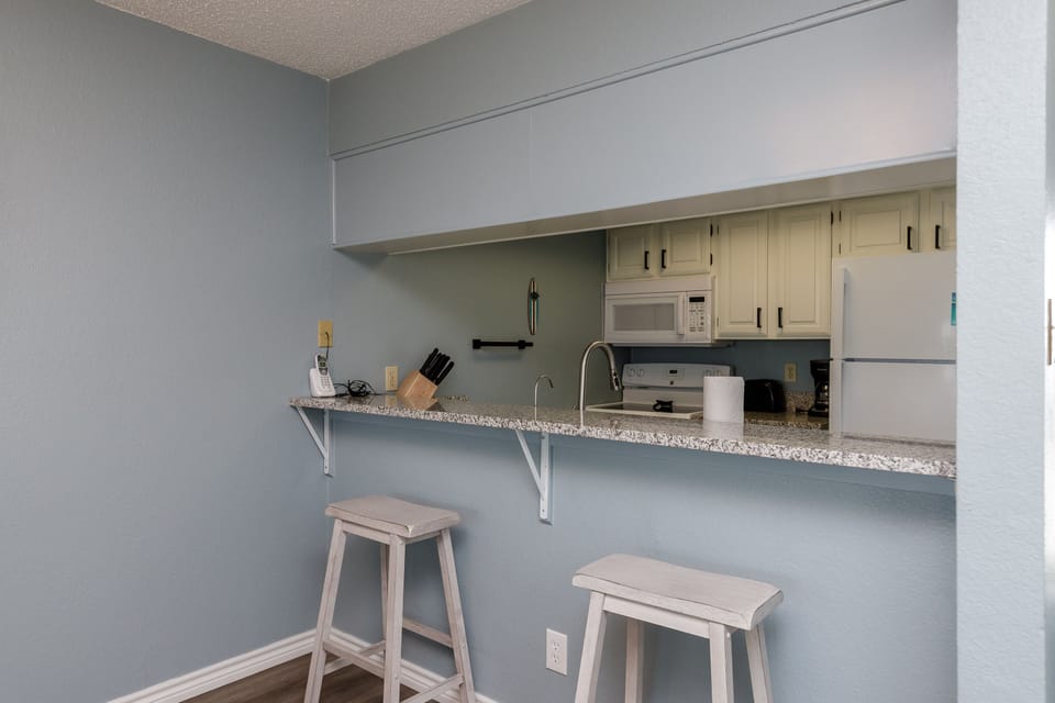 Grab a morning coffee at your breakfast bar before exploring the day's adventures.