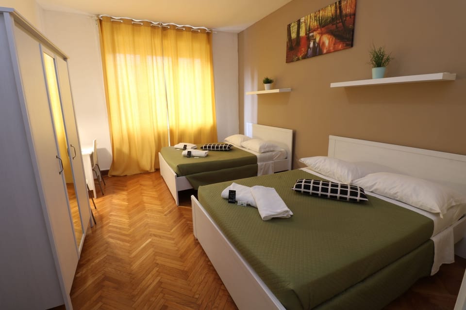 Basic Quadruple Room, External Shared Bathroom | Frette Italian sheets, premium bedding, in-room safe, desk