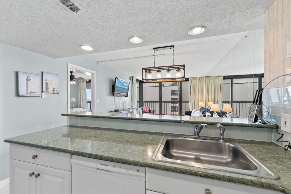 Gleaming white cabinetry and appliances throughout!