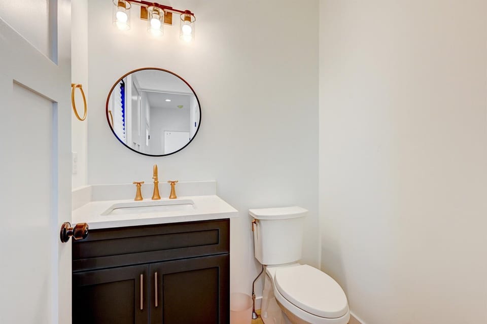 1/2 Bathroom Main Level. 
