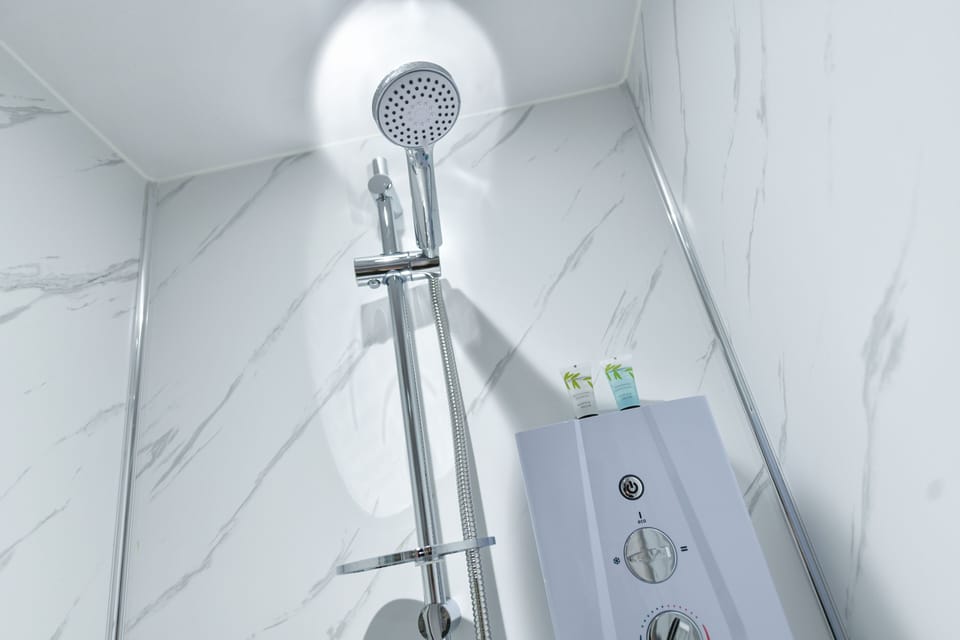 Comfort Single Room | Bathroom | Shower, hair dryer, towels, soap