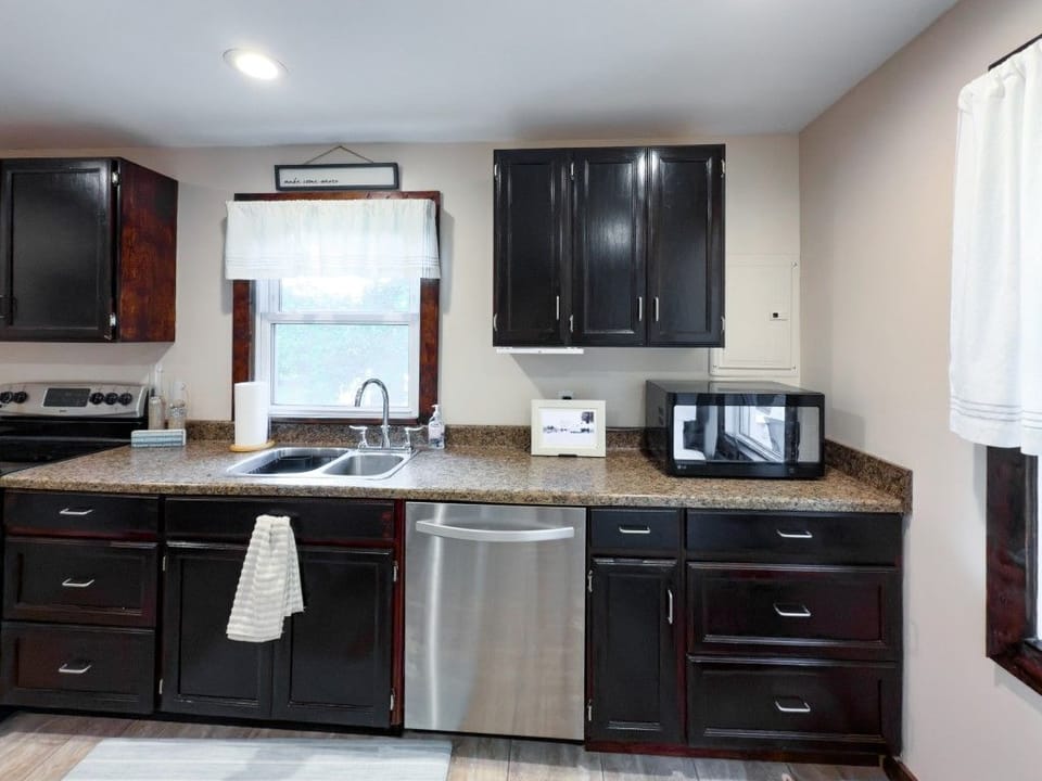  A kitchen where functionality meets rustic charm.