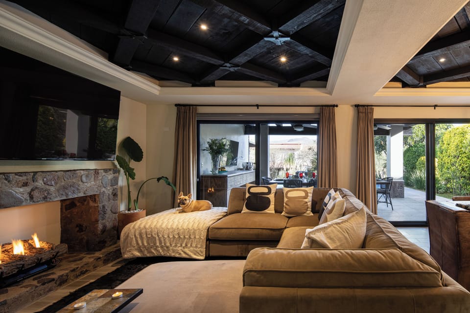 Luxury House | Living area | 50-inch Smart TV with digital channels, TV, fireplace