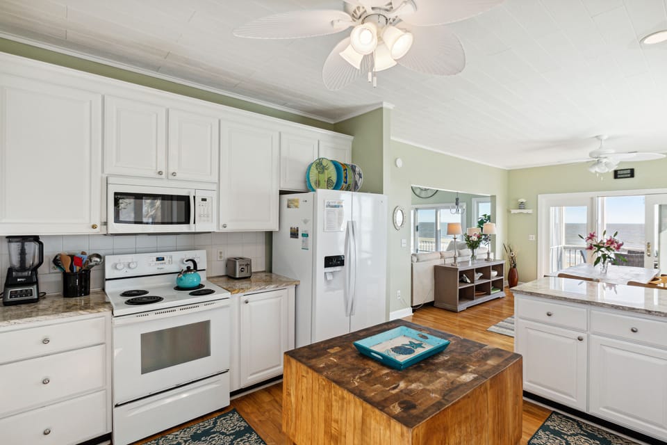 Fully equipped kitchen with everything needed for convenient cooking and effortless meal preparation.
