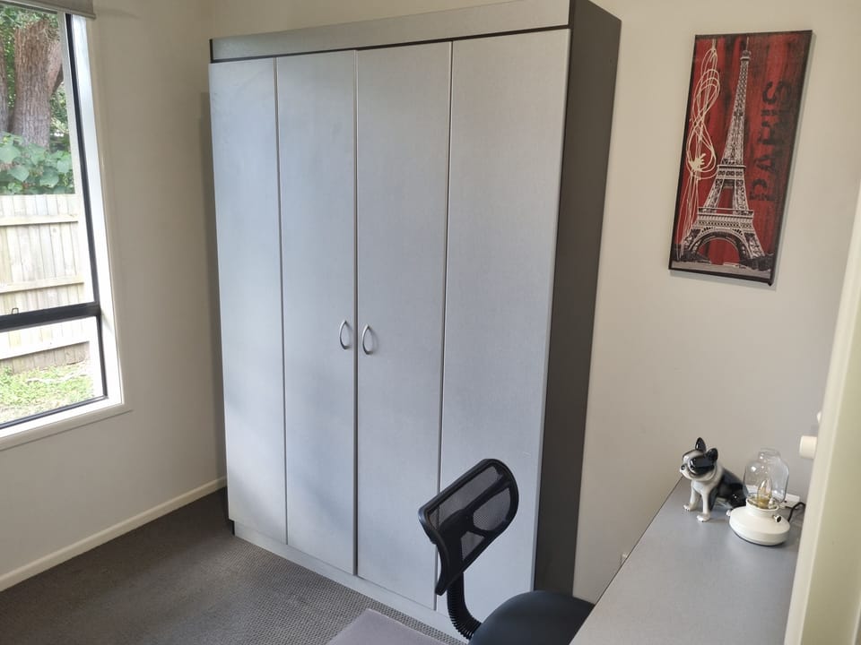 Working from home? Full desk set up by day, wall bed folds down at night. 