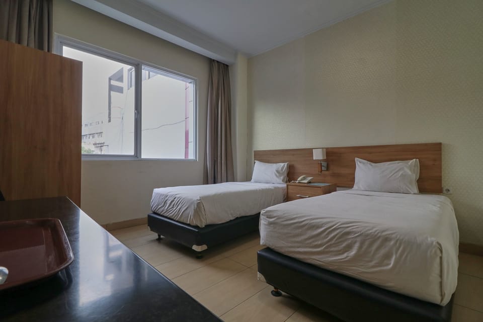 Deluxe Twin Room | Minibar, desk, free WiFi, bed sheets