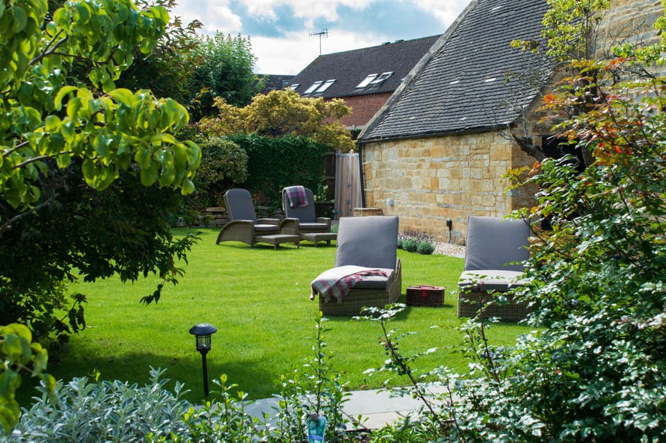 Ample of seating in the extensive garden