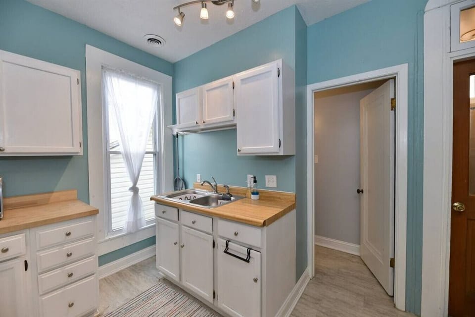 Bright kitchen with generous counter space for meal prep and everyday convenience.