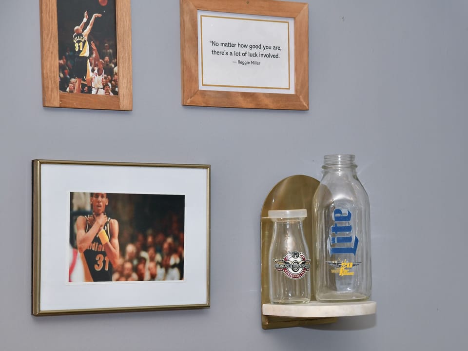 Local Indianapolis-inspired décor adds unique character and celebrates the city's rich sports and cultural history.