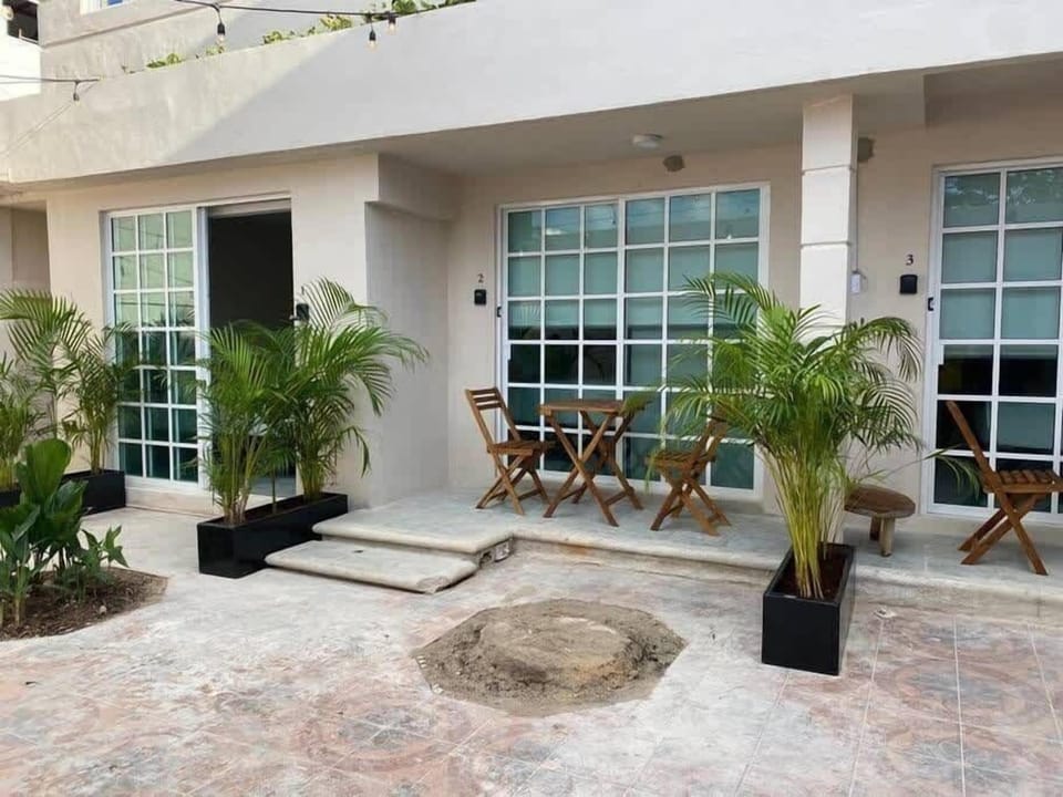 Bright living and dining area with seating
